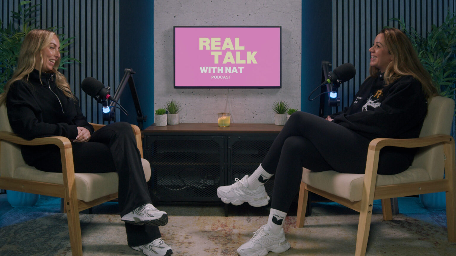 The PodSpace Bedford Real Talk recording set with people, chairs and microphones